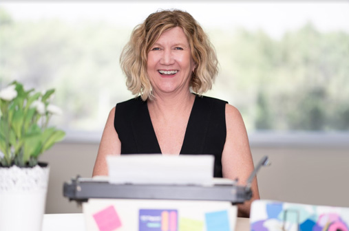 Photo of Kelli Beauchamp smiling| | Featured image for Questions to Ask Your Bookkeeper Blog